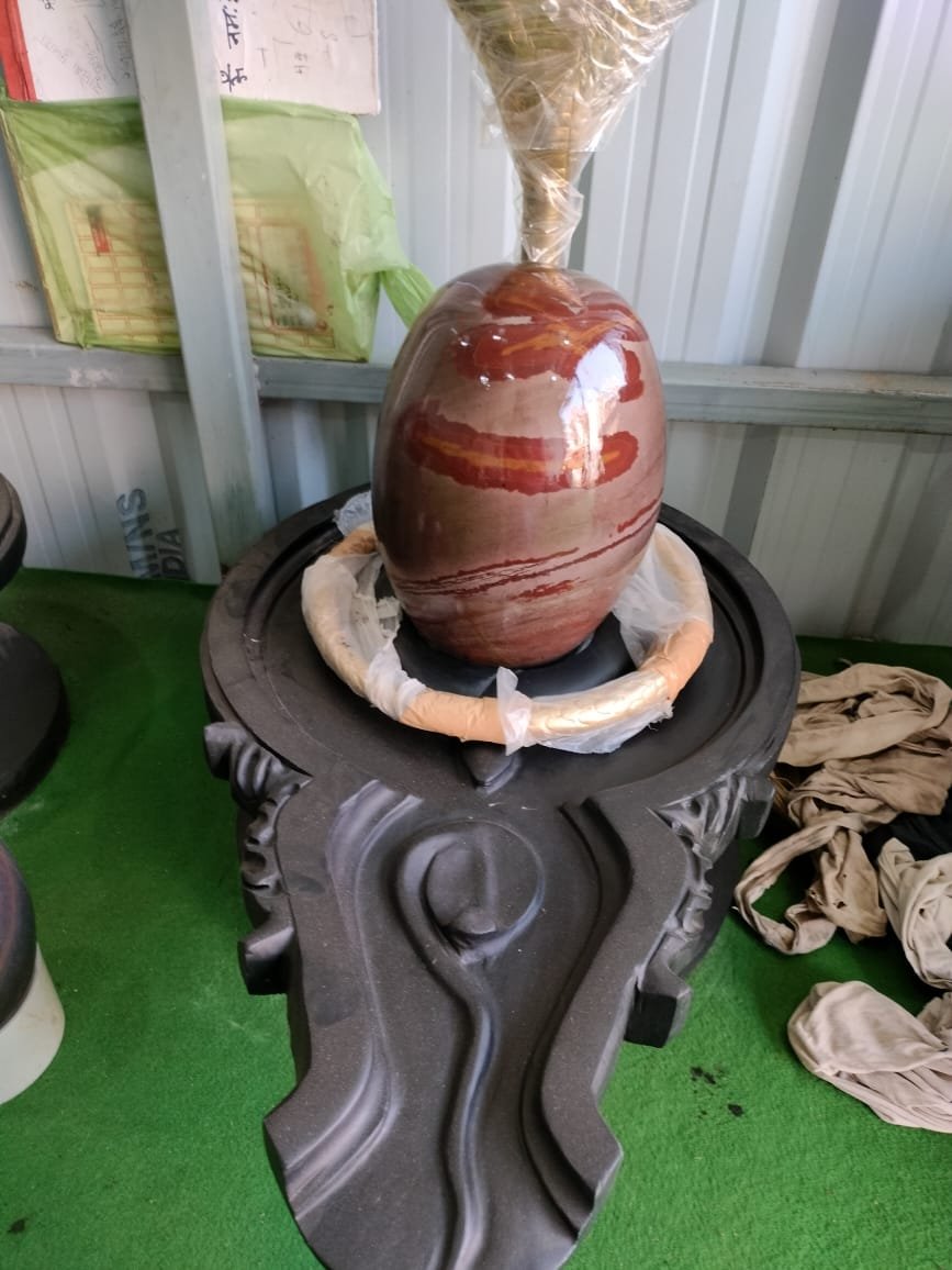 Authentic Narmadeshwar Shivling with Jaladhari — natural river stone